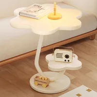 A few cream windblown hair and a few small coffee tables in the living room, a small dining table in the home, a small apartment 2