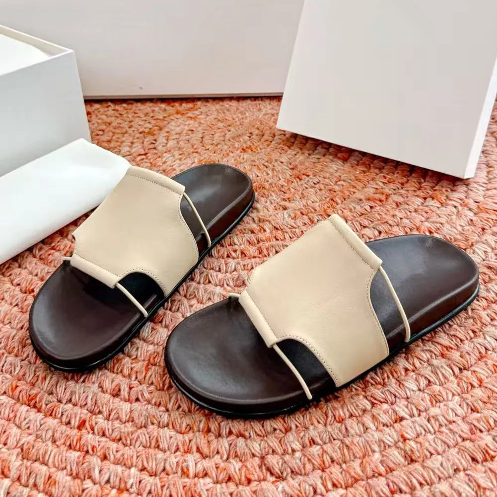 

Real leather slippers for women in the summer of 2026, new style for wearing out cool slippers, retro flat bottomed lazy person