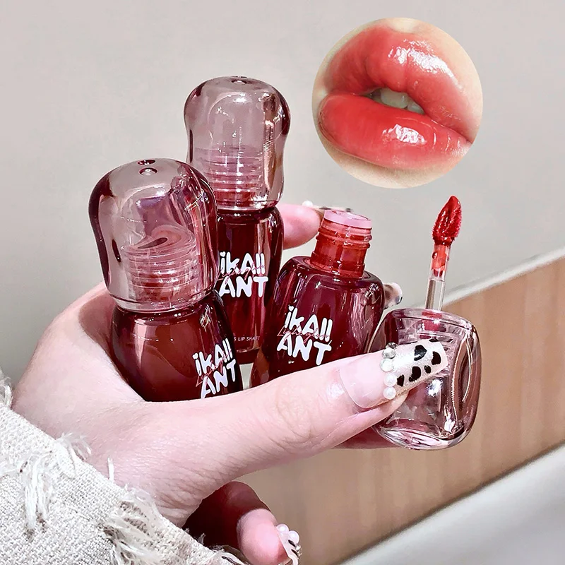 Crea colori bianchi con colori a specchio per labbra color olio, trucco umido, lucentezza trasmittata al ghiaccio, trucco labbra nella sensazione coreana di alta qualità, può abbinare con una varietà di trucchi. Adatto per la pelle gialla