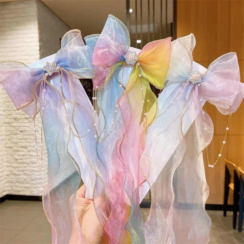 Meisjes schattige elegante mesh striklint haarclip met faux parel kwastje kristaldecoratie kleurrijke chiffon hoofddeksels voor feestkinderen