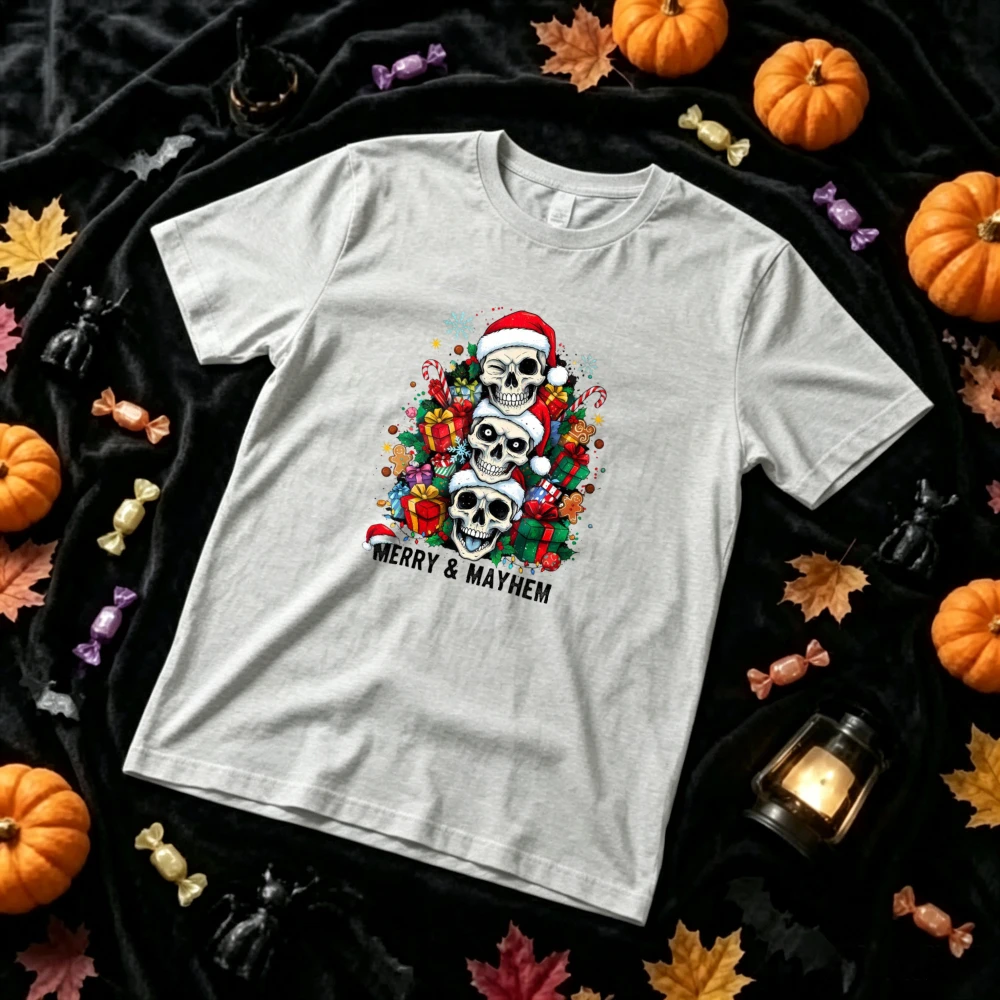 Merry & Mayhem Christmas Skull Graphic T‑Shirt Three Stacked Skulls with Santa Hat Xmas Gift Box Snowflake Print Casual Tops Tee