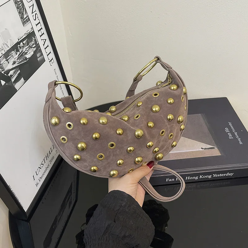 Rivet bag women's European and American fashion armpit bag retro messenger bag punk style shoulder bag dumplings