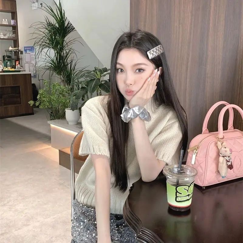 2025 automne et hiver bulle col rond pull col haut couleur unie ample à manches courtes pull pour femme