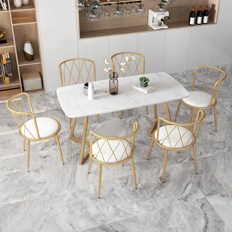 Hong Kong-style light luxury marble dining table and chair combination rectangular modern simple rock slab table small apartment