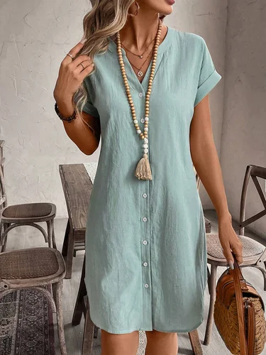 Vestido camisero con manga de ala de murciélago y botones con muescas de color sólido