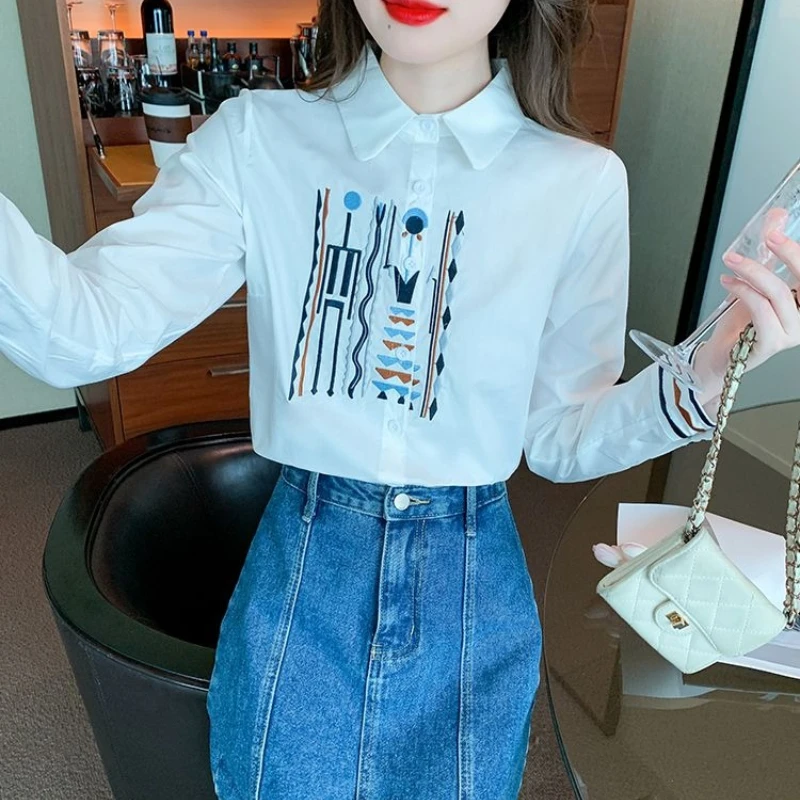 

Новая модная женская блузка весна-осень 2026: белая, с длинным рукавом, вышивка, мягкий хлопок, элегантный топ для офиса и повседневной носки