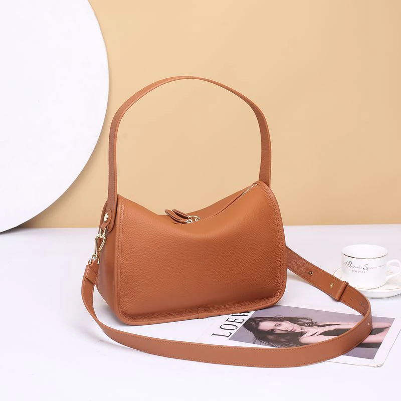 Bolso de mano versátil de cuero genuino para mujer, bandolera de un solo hombro, Color sólido, a la moda, para viaje, novedad