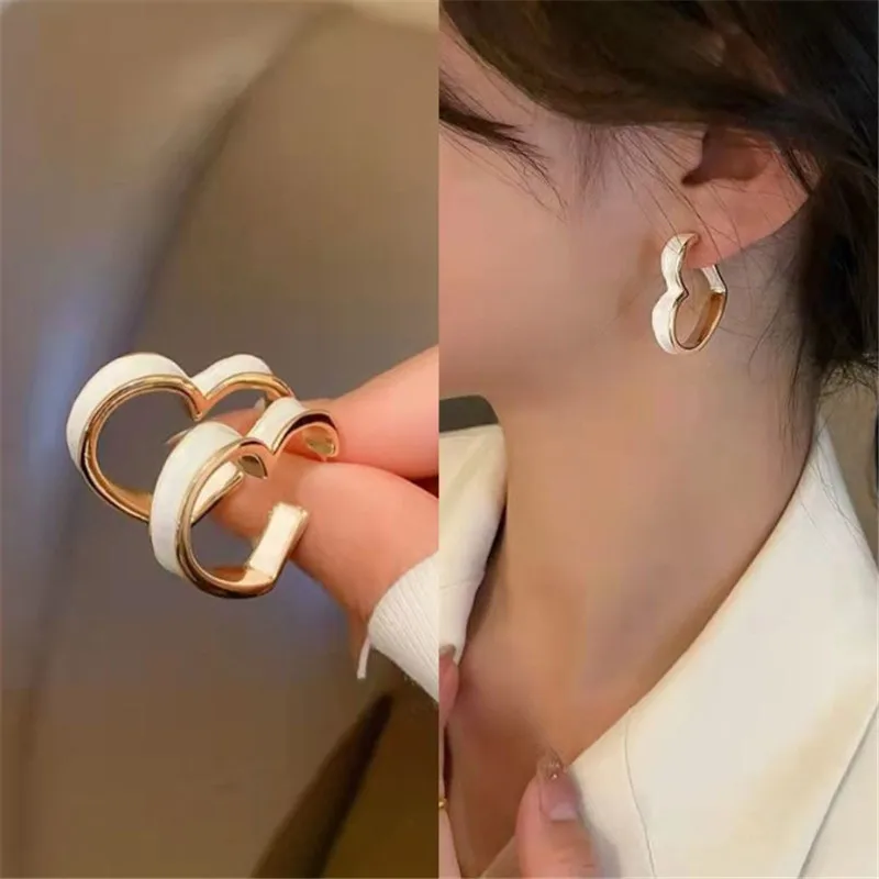 New Fashion Trend Unique Design Elegant Exquisite Light Luxury Hollow Heart Earrings Women Jewelry Wedding Party Premium Gifts