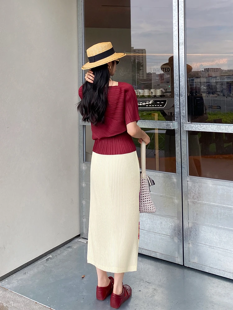 Damska spódnica midi na lato 2025, z wysokim stanem, luźna, elastyczna, w stylu vintage, z modnym nadrukiem, idealna na podróże i do noszenia na co dzień.