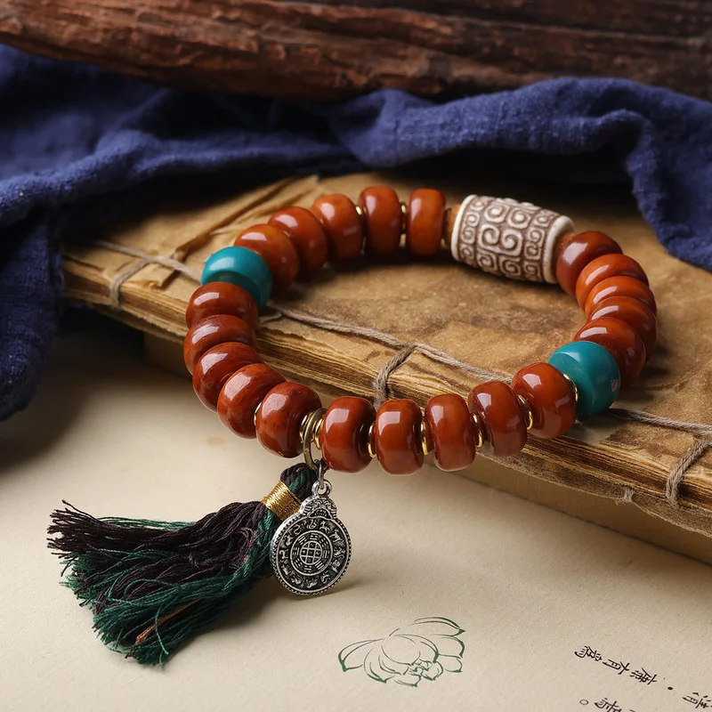 Original Tibetan-style bone and pill bead intricate patterns, a traditional charm bracelet with a nine-square desi