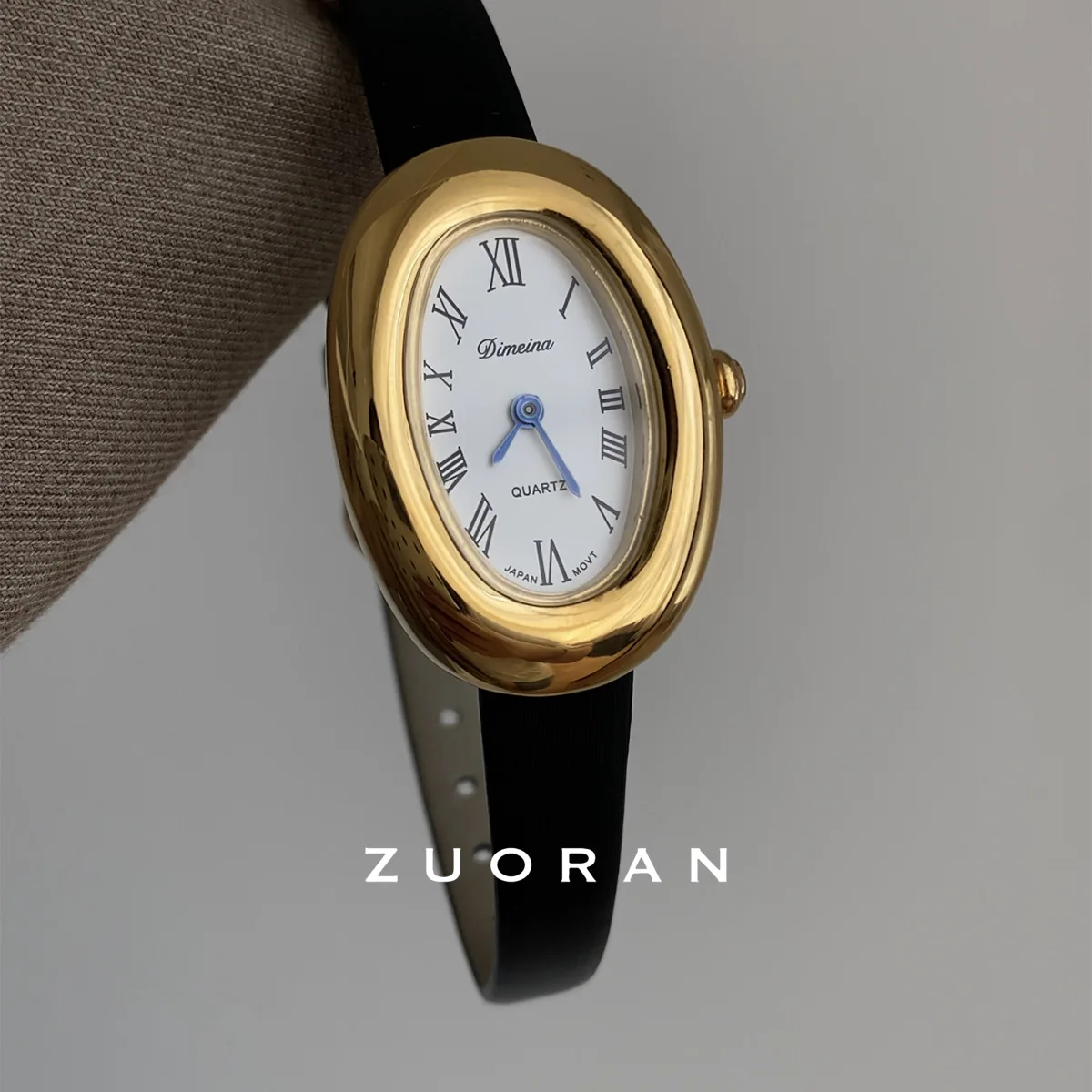 

Elegant women's wristwatch, oval-shaped, vintage-style, French-inspired, sophisticated and fashionable quartz watch.