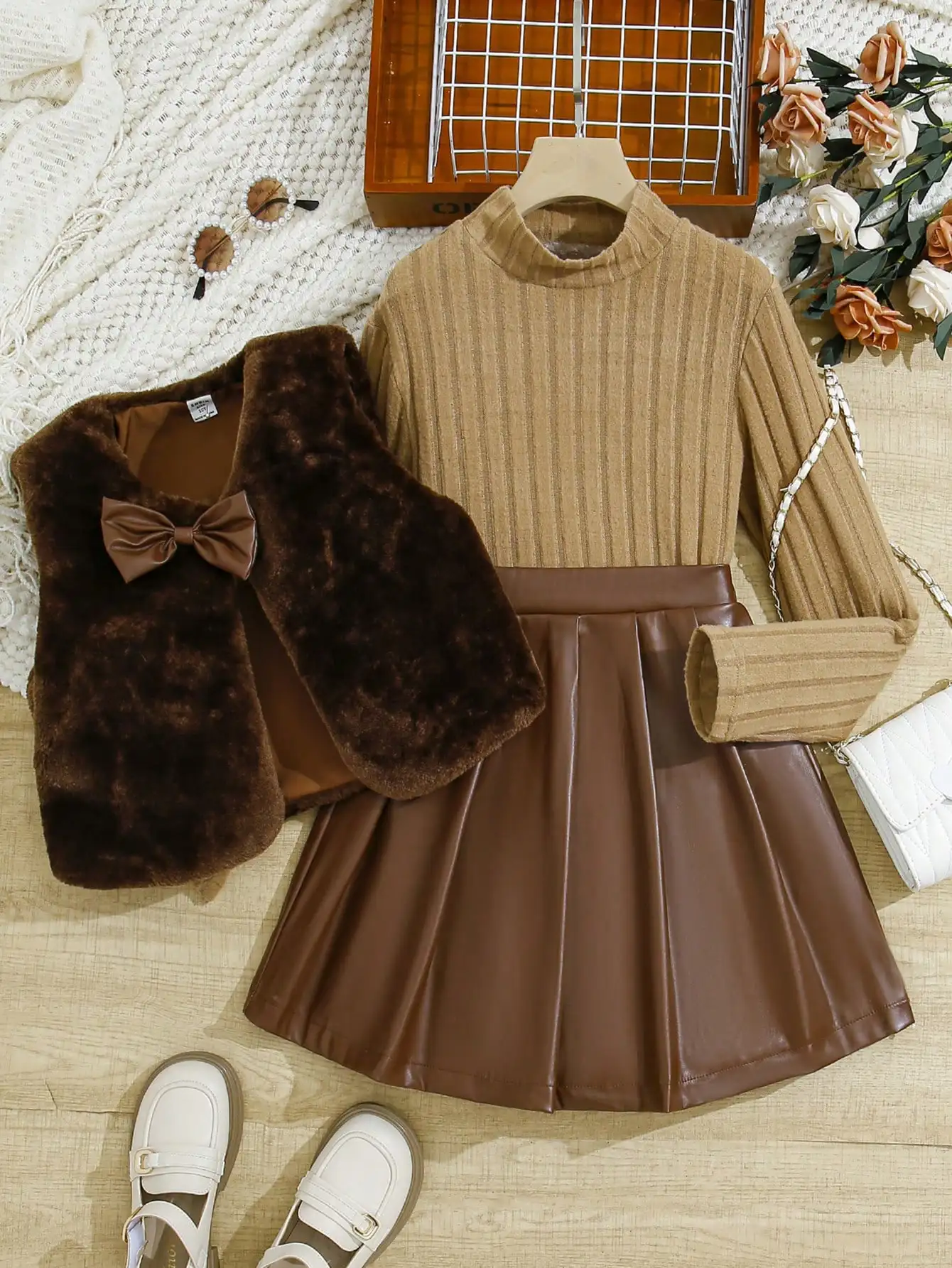 

Sweet style three-piece set for girls in autumn and winter of 2025. Bowknot fleece vest + fashionable high-neck ribbed top + PU