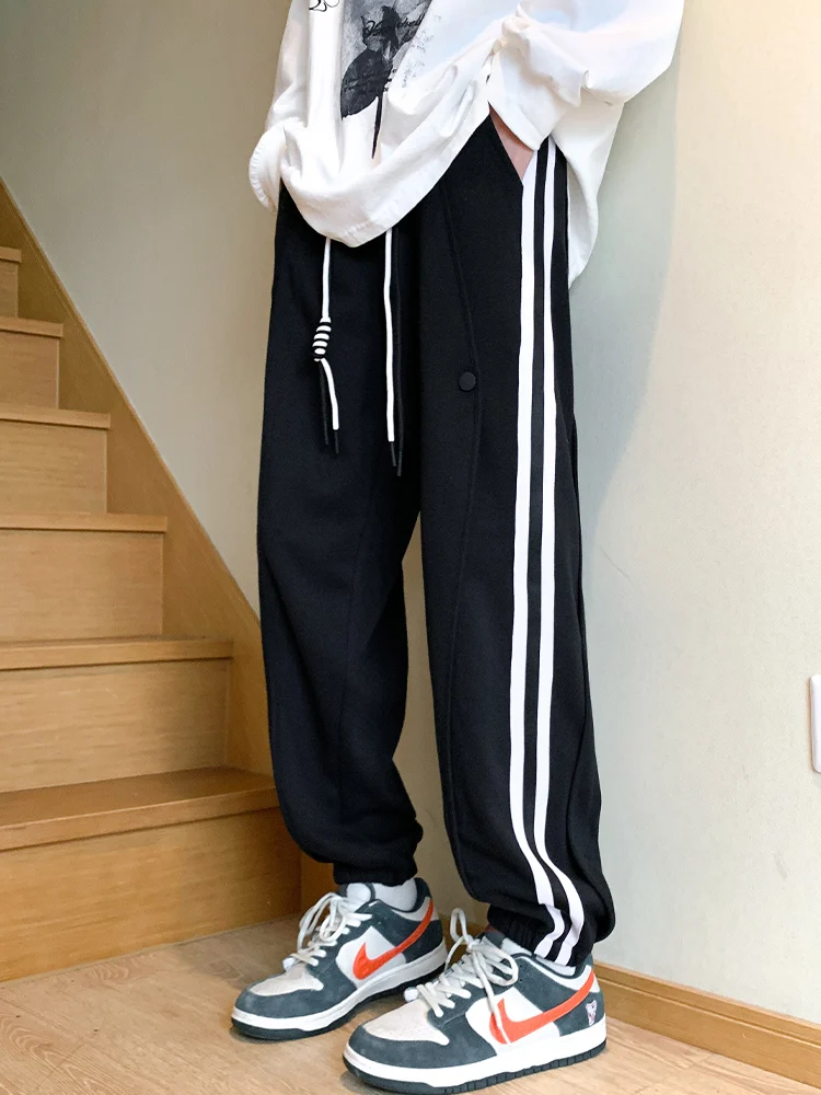 

Мужские спортивные брюки свободного кроя в полоску для весны и осени, молодежные, модные, из смесового хлопка и полиэстера