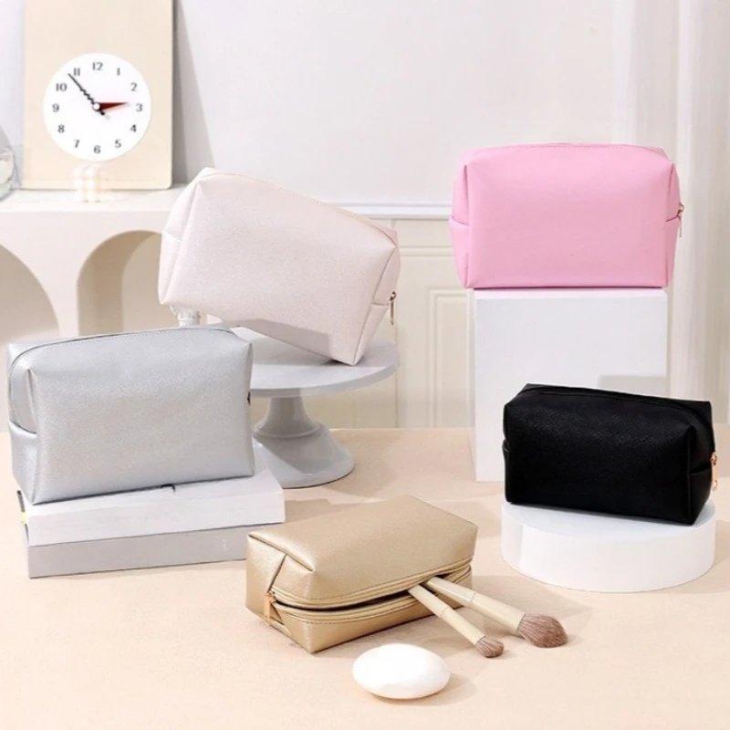 حقائب مستحضرات التجميل ذات الألوان الصلبة للنساء للسفر حقيبة تخزين المكياج المحمولة بسحاب حقيبة أدوات الزينة