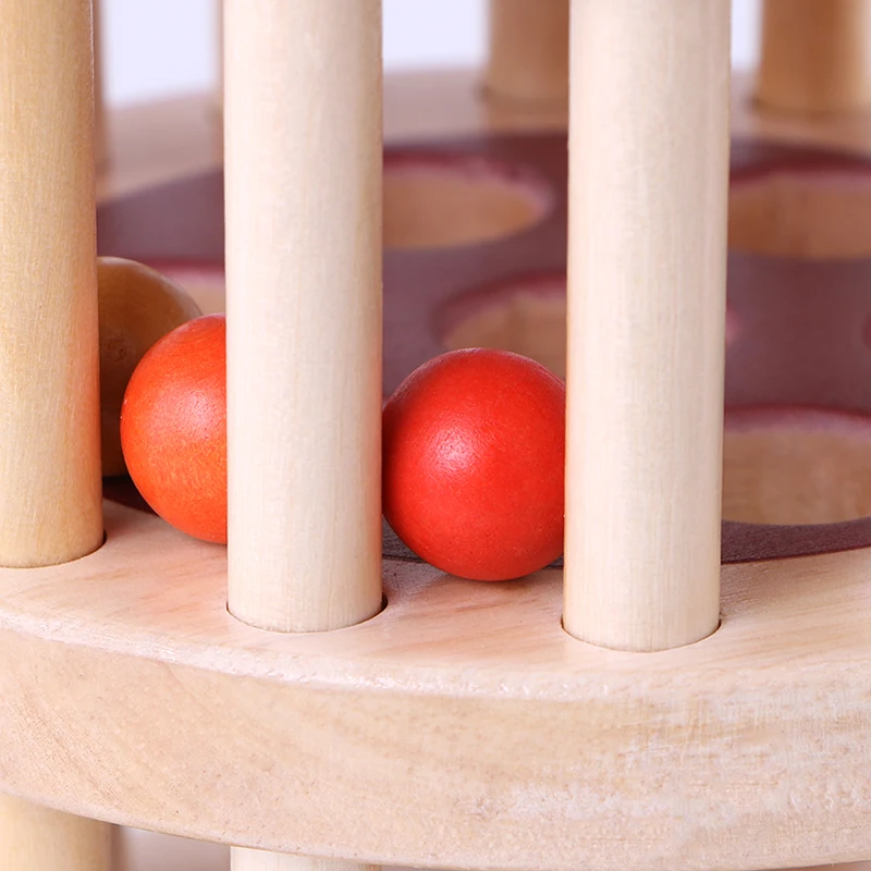 Baby exercises finger grasping ability, sensory integration training, auditory learning, crawling, visual tracking