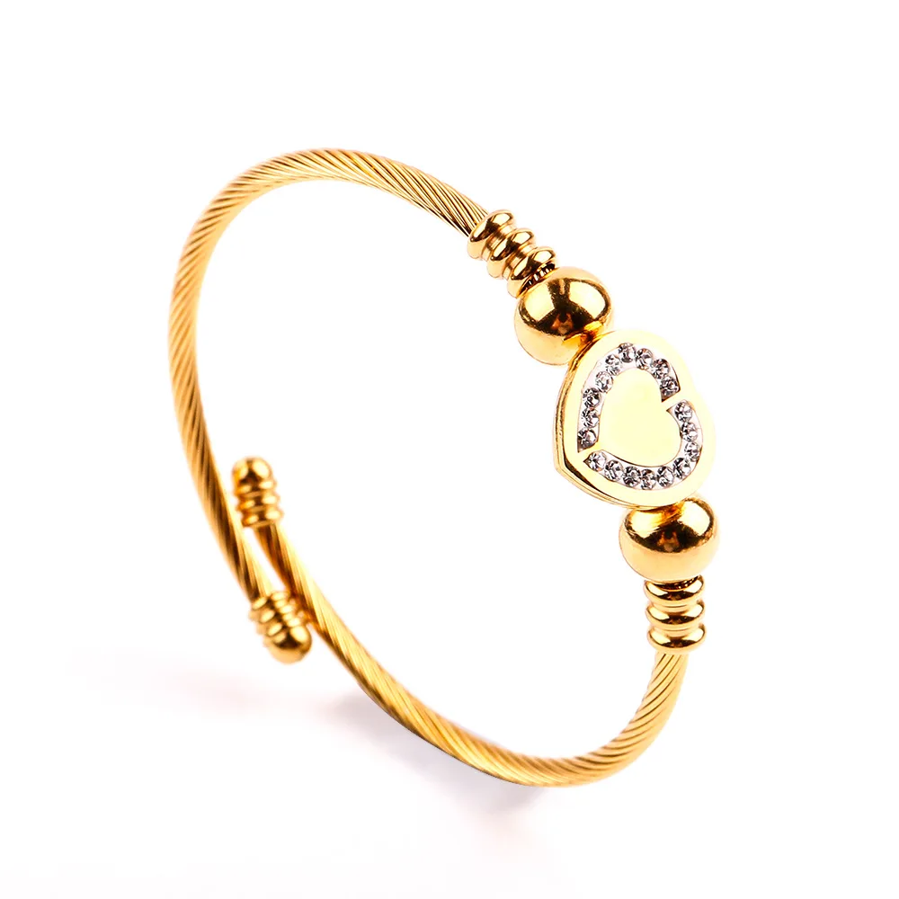 

Women's hollow independent packaging gold braided steel wire heart-shaped diamond gold open geometric titanium steel bracelet