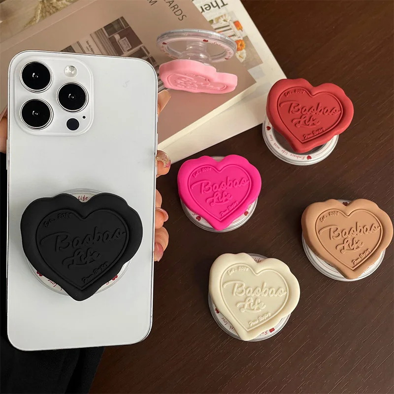 

Креативный 3D-держатель для телефона в форме сердца из силикона с магнитом, сильной адсорбцией и выдвижной подставкой для iPhone 17, для ежедневного использования девочками