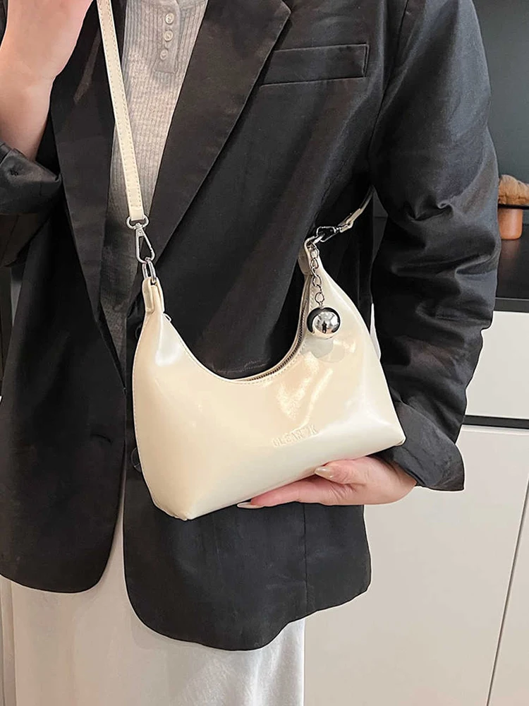 Podręczna modna torba damska Wiosna Nowa koreańska torba rekreacyjna z łańcuszkiem Pojedyncze torby na ramię Premium Solid Color PU Leather Crossbody Pack