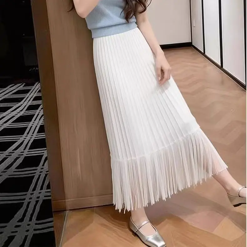 French holiday style sleeveless knitted sweater pleated skirt two-piece set women's summer high-end sense beautiful set 2026 new