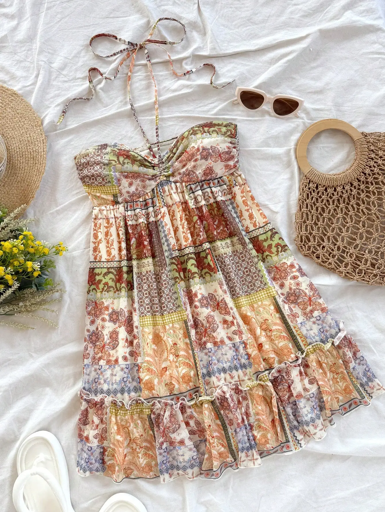 

Bohemian Patchwork Print Halter Mini Dress with Ruffles and Drawstring Tie