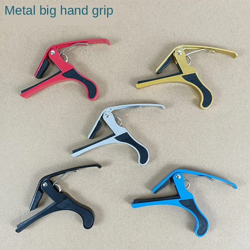

Big Hand Grabbing Guitar Capo Metal Transposing Clip Bakelite Folk Ballad CAPO Tuning Clips Guitar Accessories