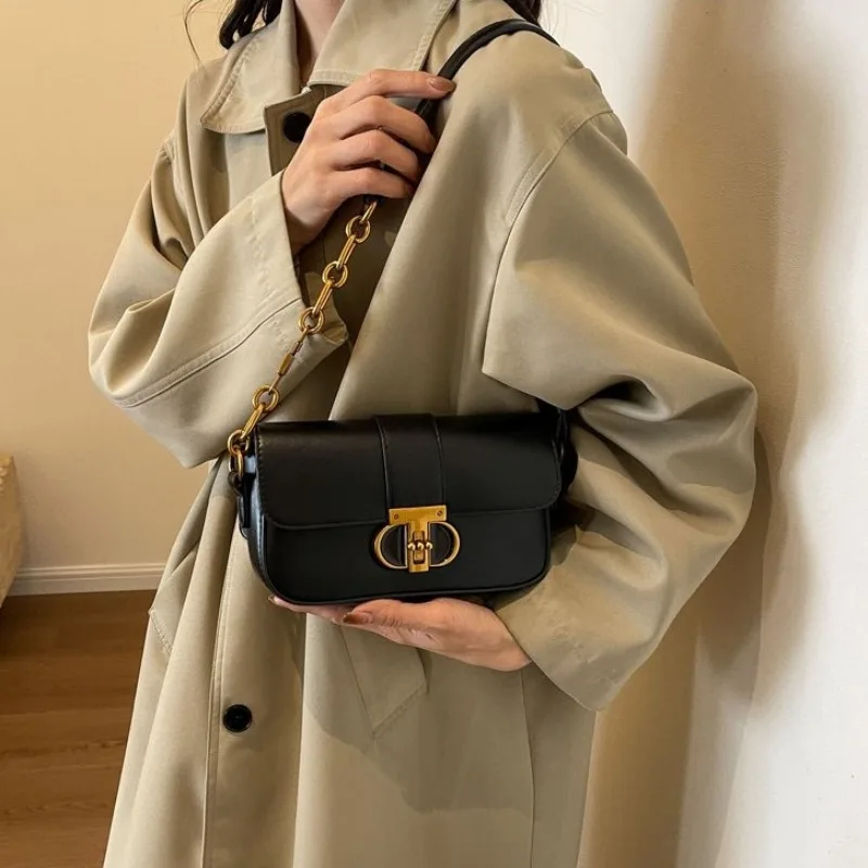 

Женская функциональная сумочка, организованная для рабочих документов, личные предметы, практичный дизайн