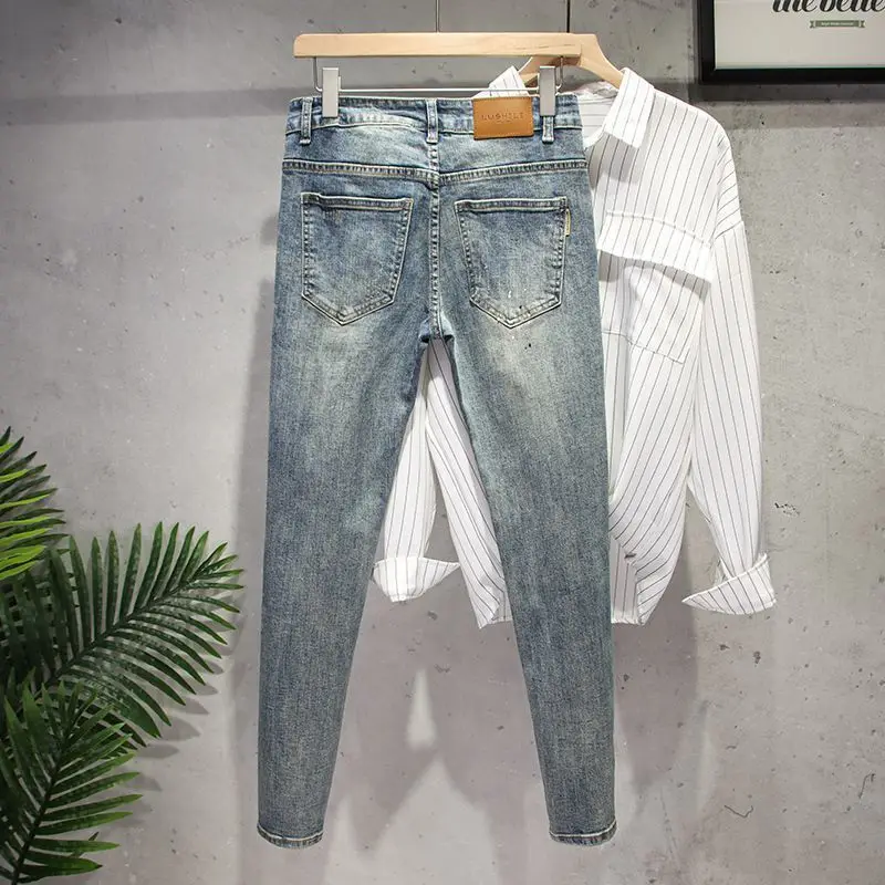 Fashion Slim Luxury Jeans for Men with Ripped Holes and Painted Spots Spring and Autumn Denim Casual Pants Designer Men's Jeans