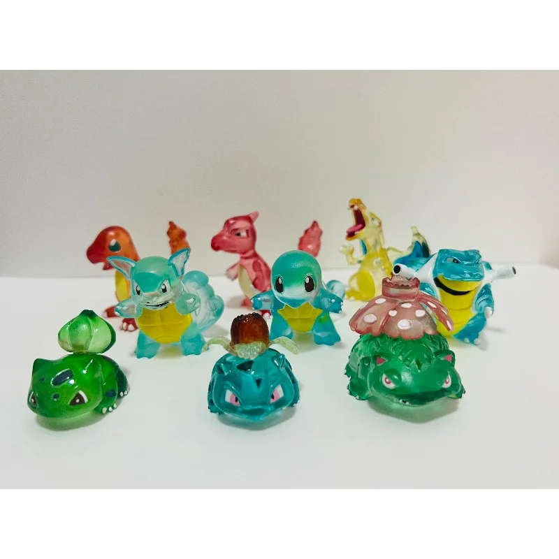 ポケモンフィギュアヒトカゲリザードンドラカウフエグルラックビニュウサウアーゼニガメゼニガメブラストイズトルタンクタートーク透明人形おもちゃ