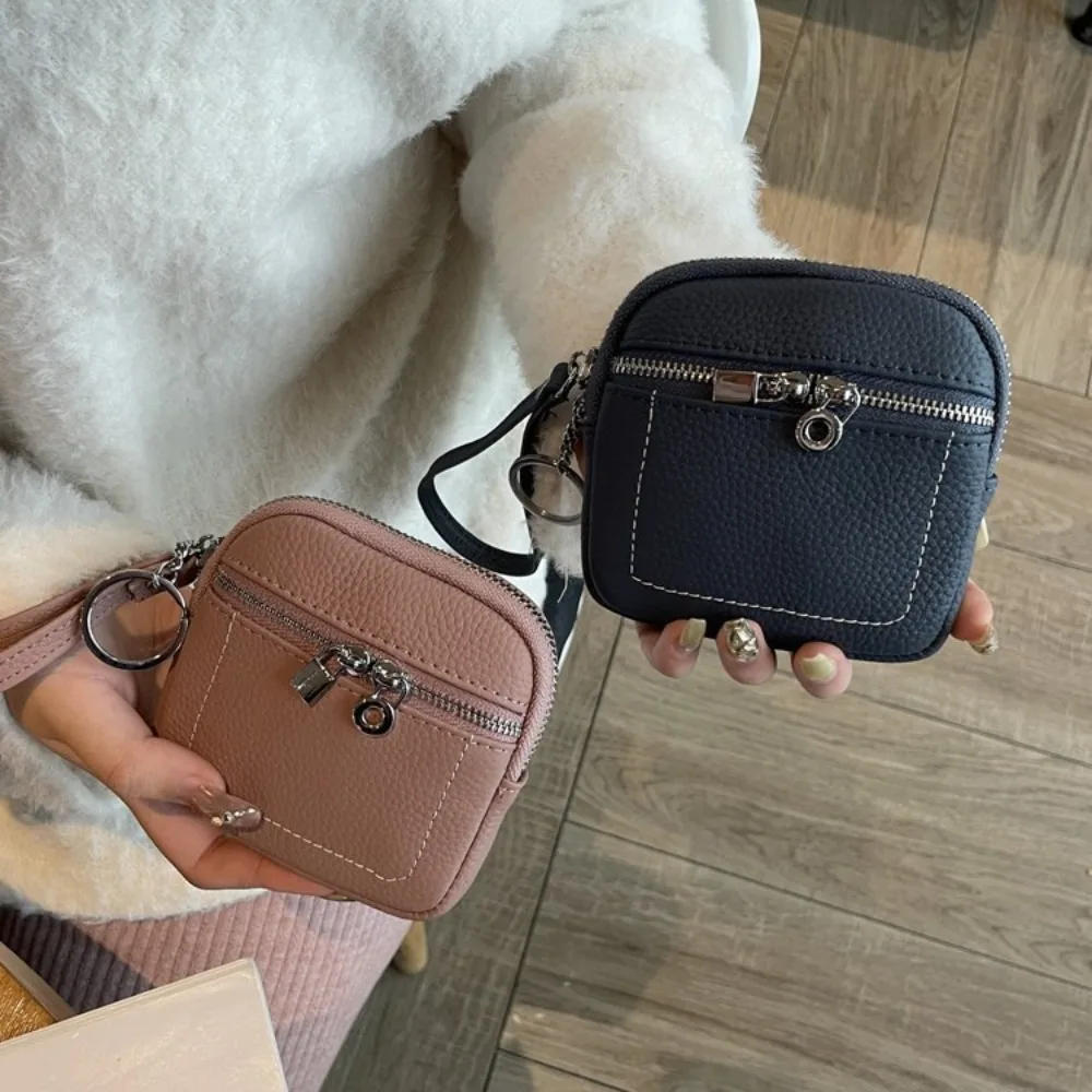 แฟชั่นซิปกระเป๋าใส่เหรียญหนัง PU พร้อมเชือกเส้นเล็กกระเป๋ารายการขนาดเล็กน้ําหนักเบาสีทึบลิปสติกหูฟังกระเป๋า