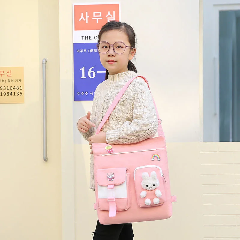 

New Children's Canvas Bag Korean Fashion Primary School Handbag Large Capacity Cartoon Waterproof Portable Bag High end Design