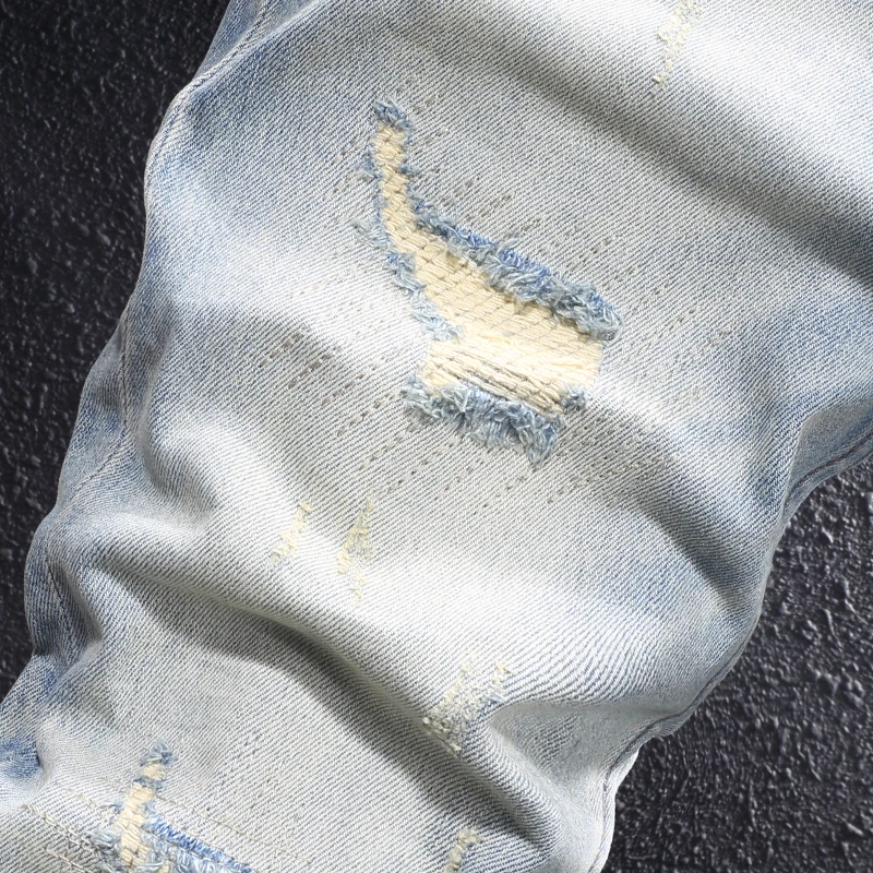 Y2Knew denim jeans, washed with nostalgia, elastic, slim fit, pleated, painted light blue jeans, high street embroidere