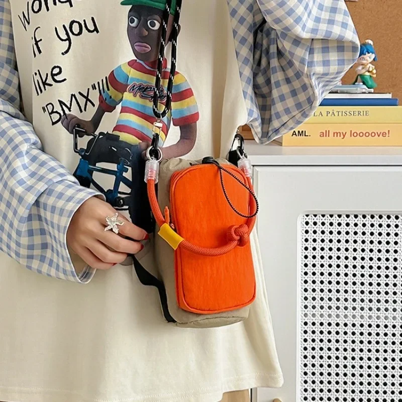 Sports Nylon Shoulder Bag Nylon Rope Coin Pouch Drawstring Crossbody Bag Korean Style Solid Color Mobile Phone Pack Outdoor