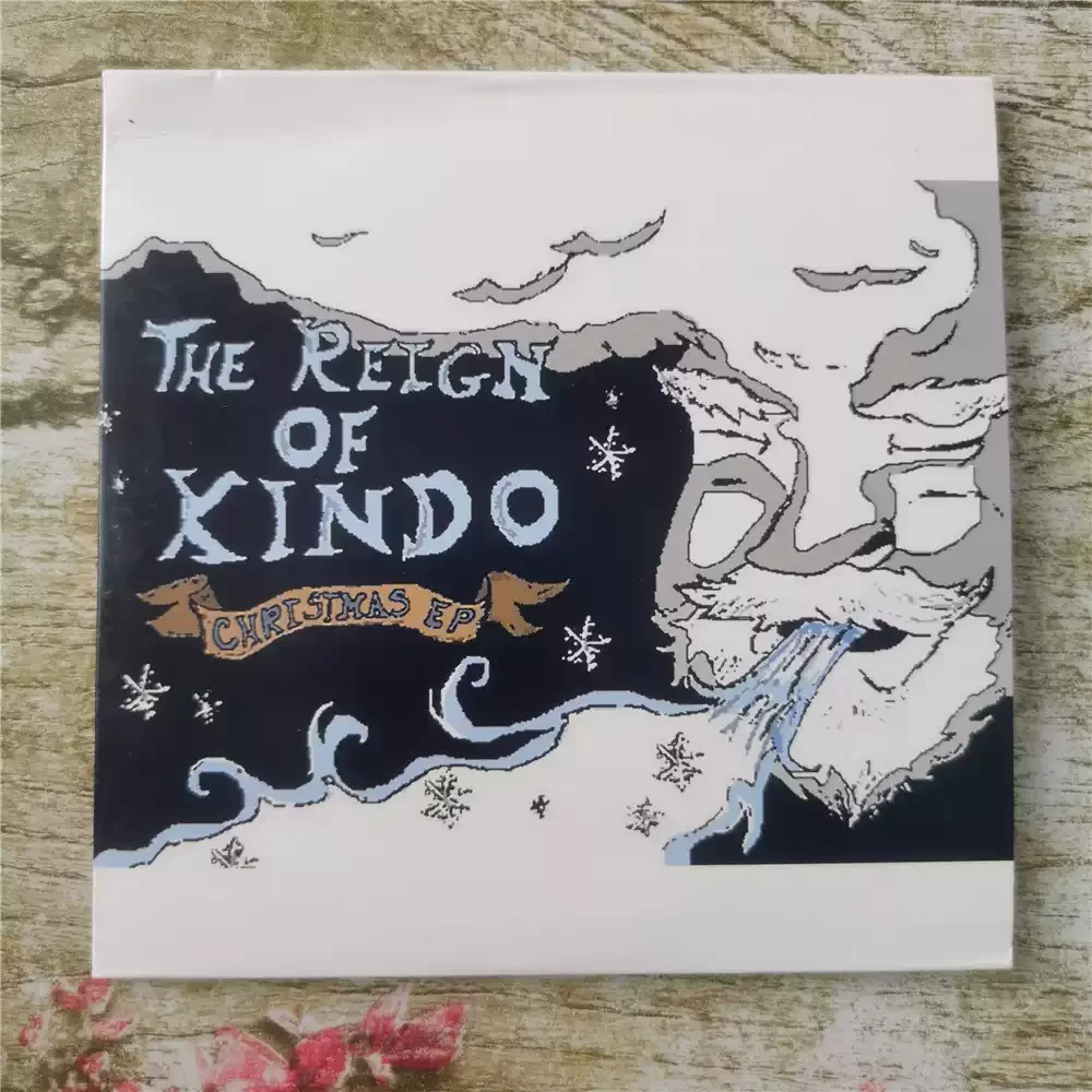 

CD The Reign of Kindo Christmas EP Is The Band's Holiday-limited EP Подходит для слушателей, которые любят Рождественскую музыка в стиле джаза