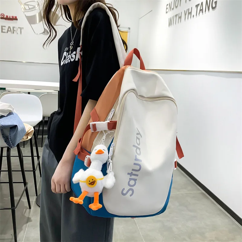 Mochila de color Sen para estudiantes de secundaria, versión surcoreana de estudiantes universitarios, para parejas, es una tendencia