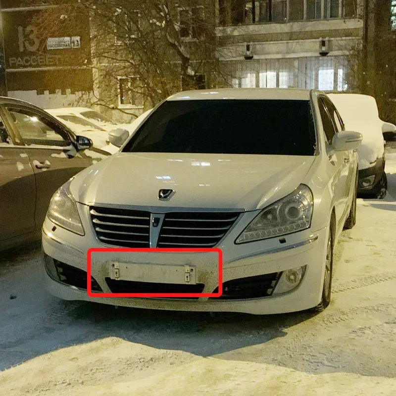 Spring loaded number plate holder