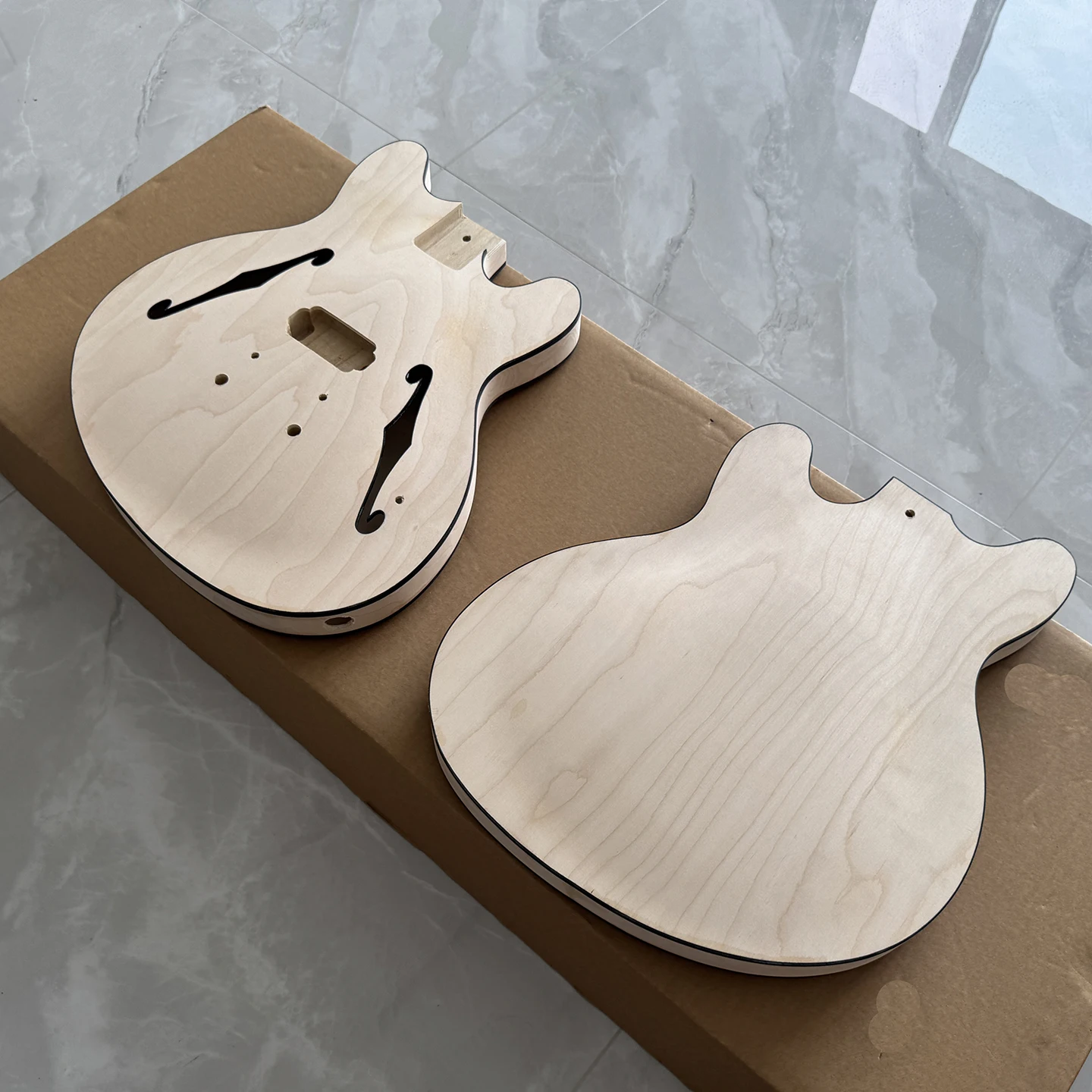 High quality Starcaster electric guitar body,maple wood material,black edge,unpainted,in stock