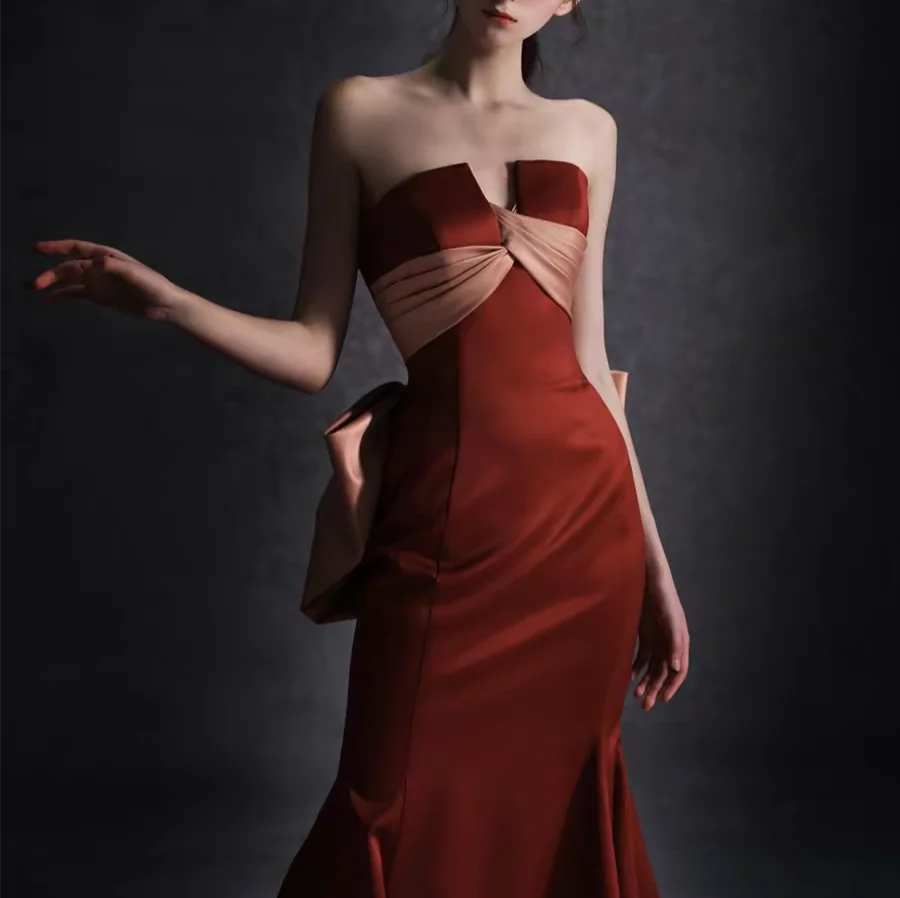 customized classy burgundy strapless satin mermaid evening dress matched with soft blush sash and oversized statement bow