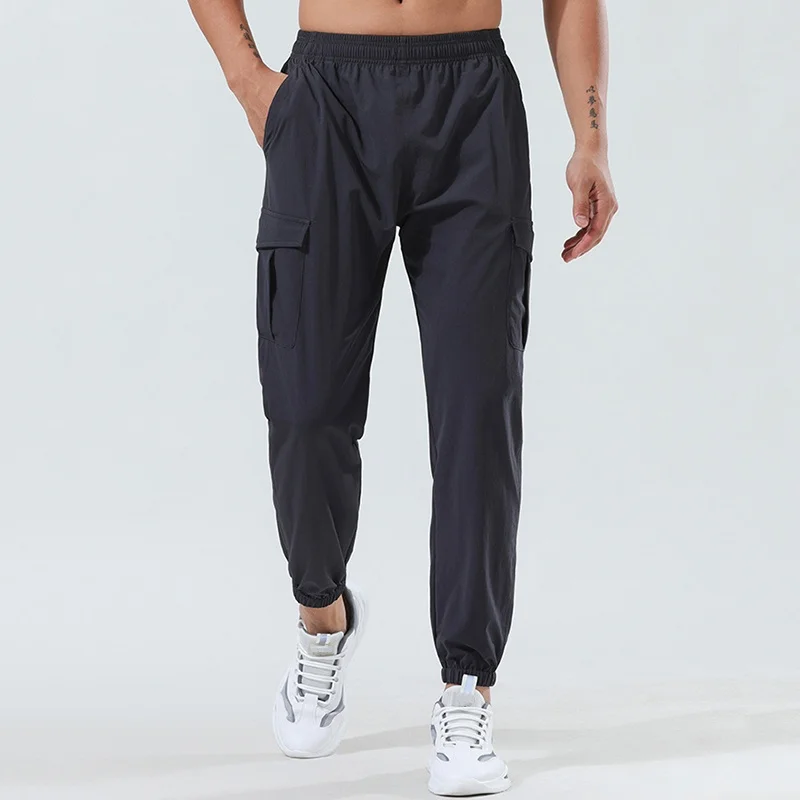 Yoga sports pants with logo men loose cuffed pants multi-pocket niners cargo pants hidden drawstring hiking trousers sweatpants