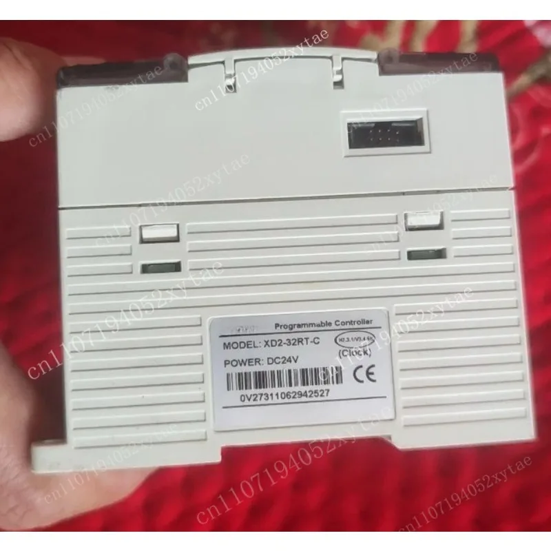 XD2-32RT-C, DC24V powered, 18 input 14 output transistor/relay hybrid output, tested OK