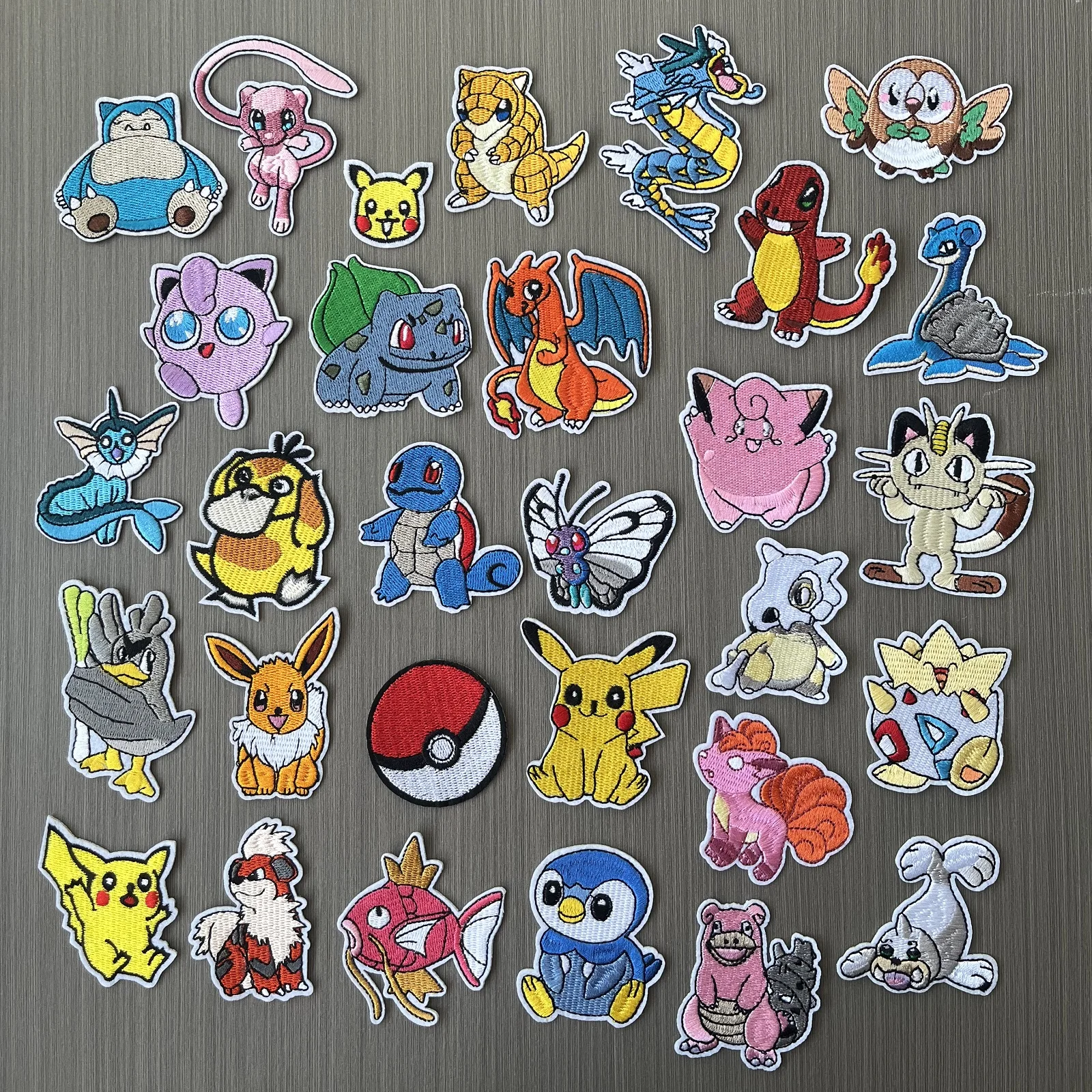 

16-22-30Pcs Anime Pikachu Pokemon Game Monster Character For Sew Clothes Iron on Adhesive Embroidery Patches DIY Jeans Applique
