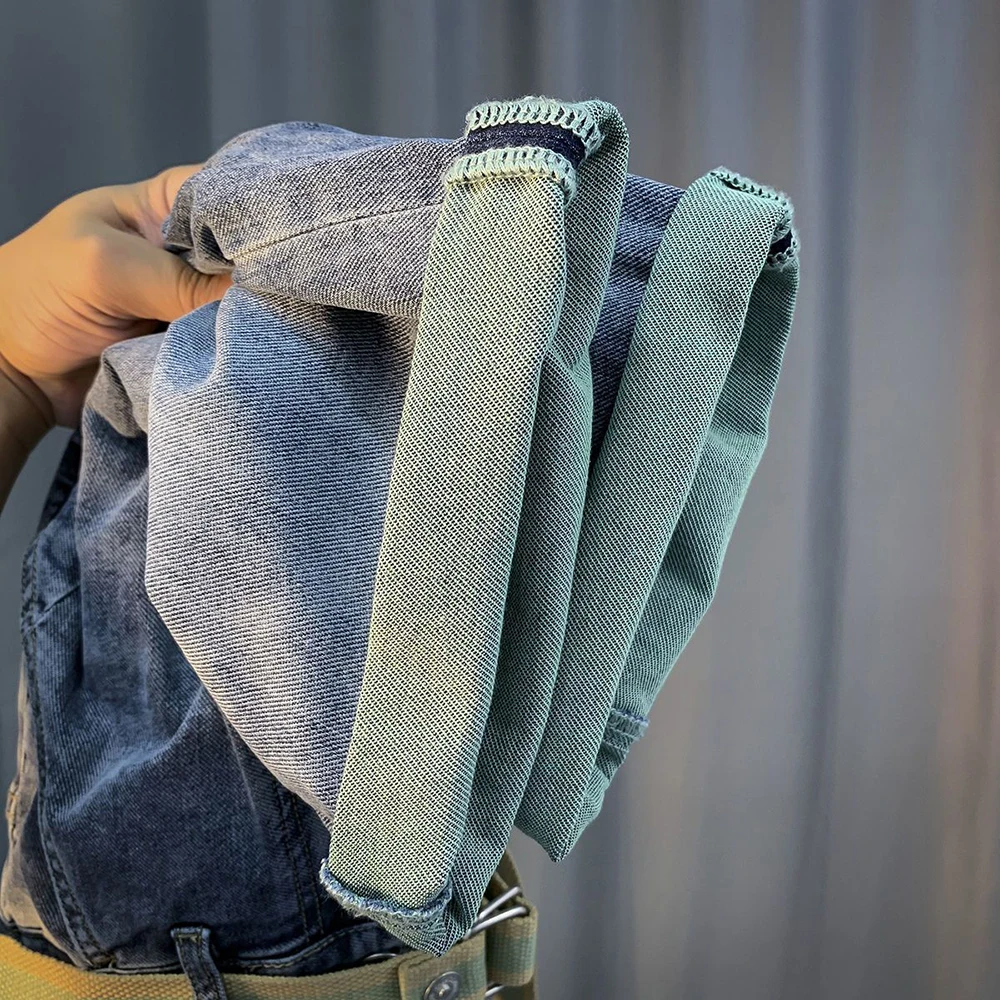 شورت دينم رجالي صيفي رقيق لعام 2025 مع جيوب موضة ريترو موضة الشارع الاتجاه غير رسمي متعدد الاستخدامات فضفاض ومريح قيعان رجالية