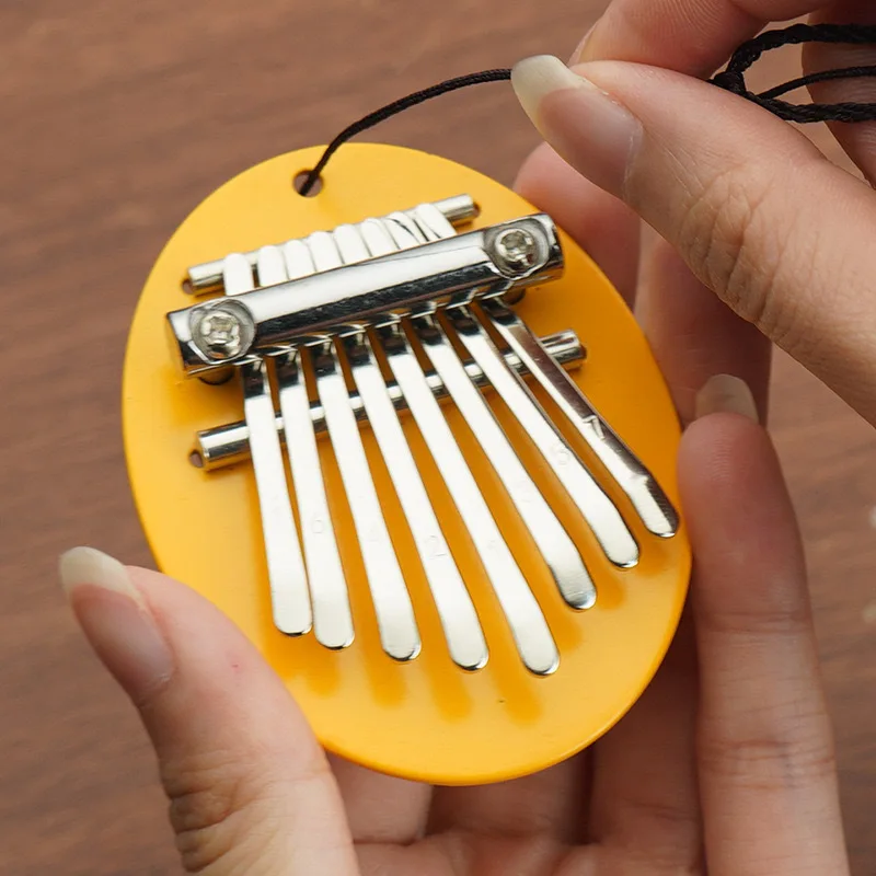 8 Keys Mini Kalimba Thumb Piano Portable Finger Piano Cute Pendant Toy for Kids Beginners with Metal Base view 5
