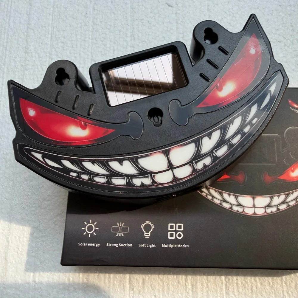 The Solar Powered LED Decorative Light Is Easy And Convenient To install Using Suction Cups Featuring A Demon Face Design