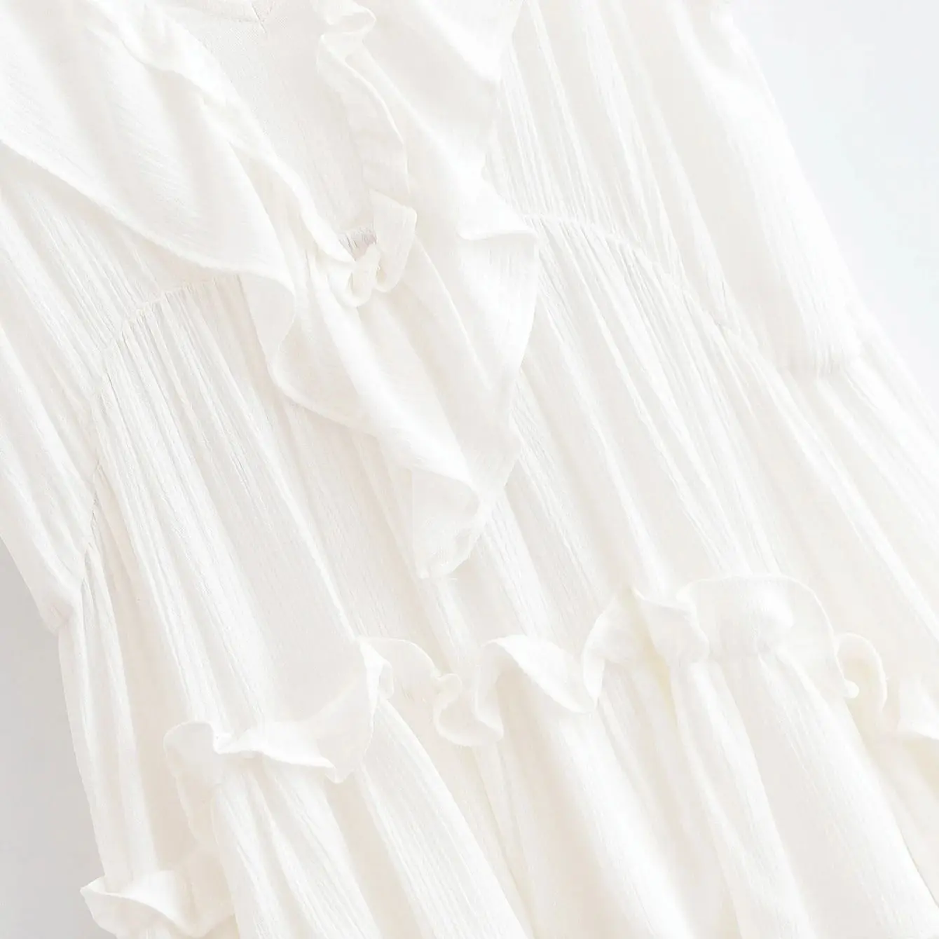 2025 BOHO Estate Bianco Nero Orecchie di legno Ruffles Scollo a V Abito senza maniche Donna Cascata allentata Orlo foderato Abiti corti Summr Robe