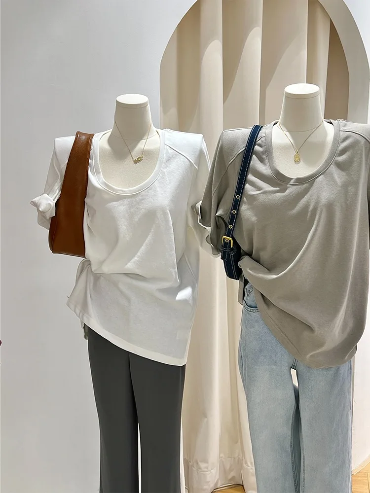Camiseta holgada con hombreras para mujer, nueva versión coreana de verano, diseño informal, cuello en U, manga corta, blanca, top con hombreras