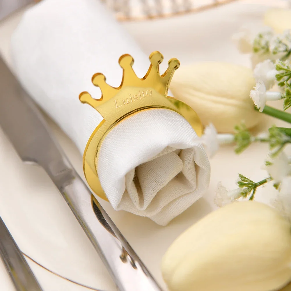 

Personalised napkin rings. Engraved crown shape. Acrylic. customised with artistic names. Table decorations.