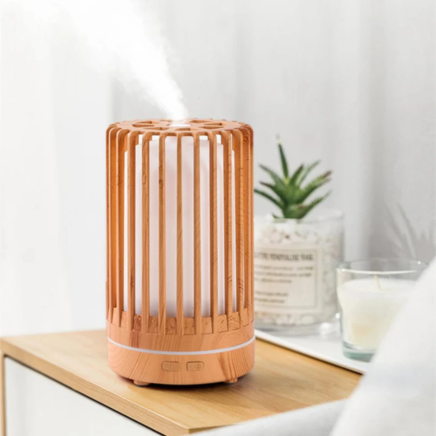 Upgrade your living space with this serene and stylish essential oil diffuser. Not only does it purify the air, but also creates