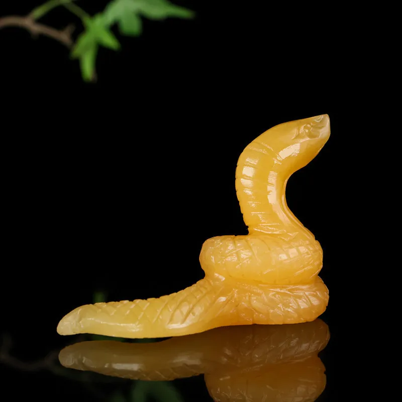 Natural jade beige jade zodiac snake ornament, a fortune-bringing mascot for home, living room, office, and desktop decoration