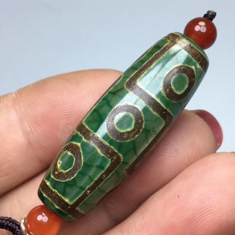 The New Hetian Jade Agate Nine-eye Dzi Bead Pendant Is The Same for Men and Women.