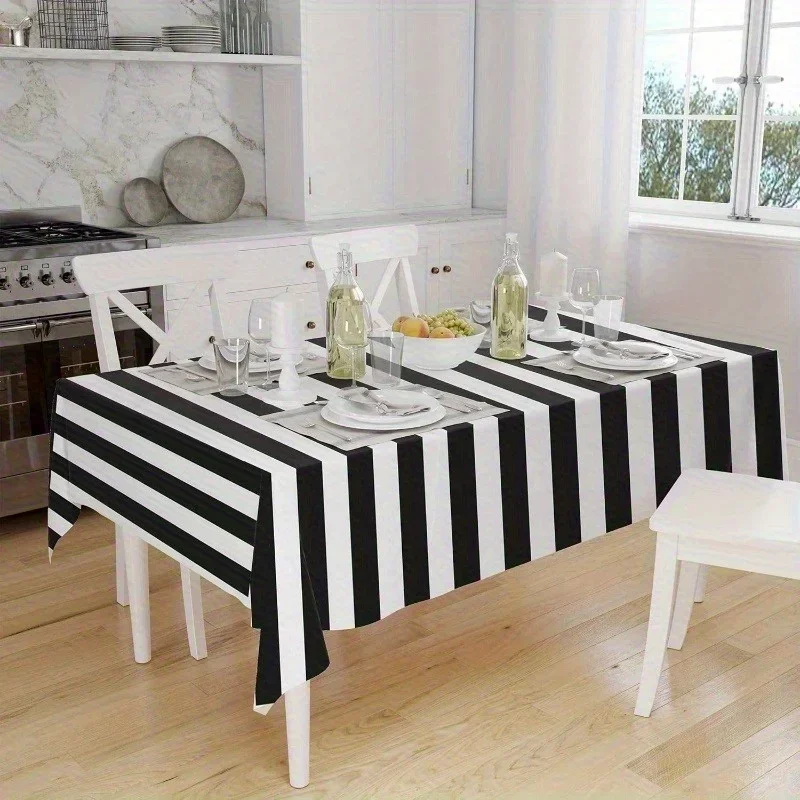 One fashionable striped tablecloth, adding modern touch to the dining table. Rectangular, durable polyester fabric.zyc
